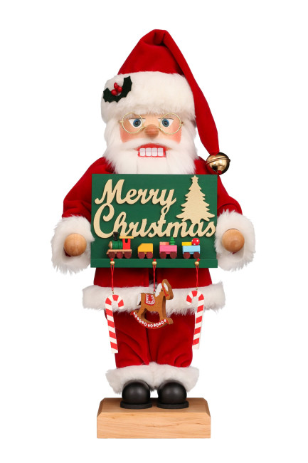 Nussknacker Weihnachtsmann mit Schild Merry Christmas