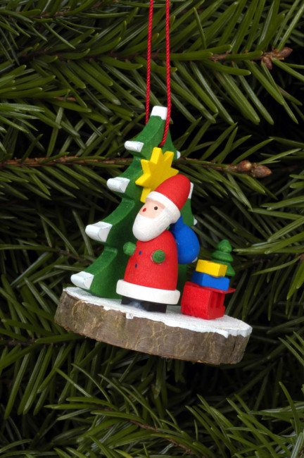 Baumbehang Weihnachtsmann mit Schlitten auf Baumscheibe