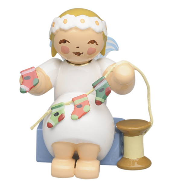 Margeritenengel sitzend mit stilisiertem Adventskalender