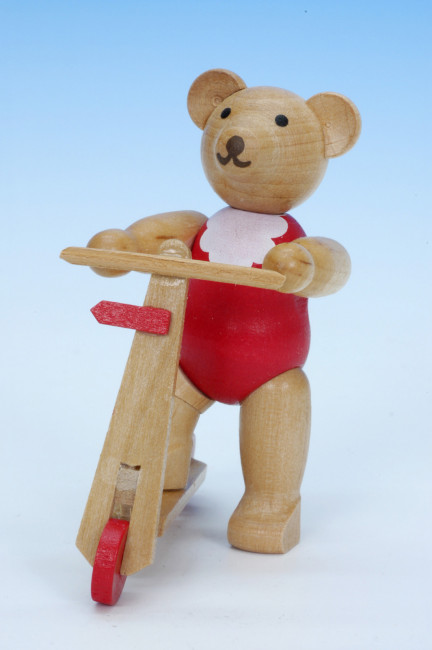 Teddybär auf Roller