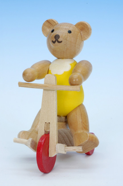 Teddybär auf Dreirad