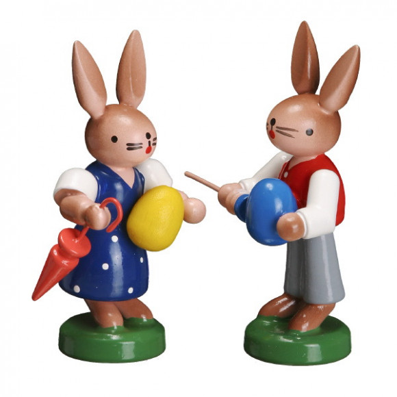 Hasenkinderpärchen mit Schirm und Ei