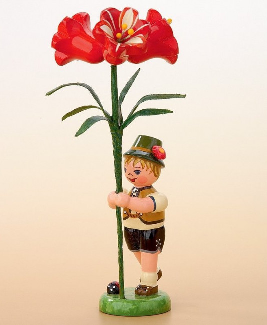 Blumenkind Junge mit Amaryllis