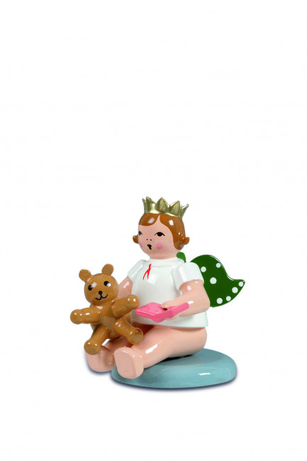 Engel sitzend mit Teddybär