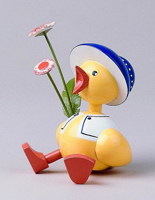 Küken blau mit Gänseblume