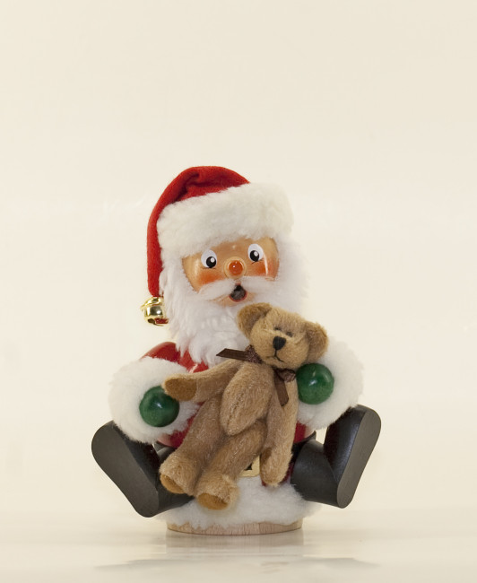 Räuchermann Weihnachtsmann mit Teddy sitzend