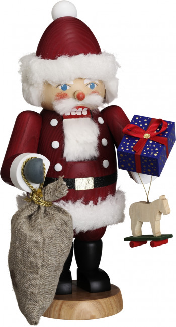 Nussknacker Weihnachtsmann mit Geschenkpaket