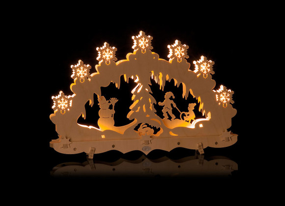 Lichterbogen mit Schlittenfahrer