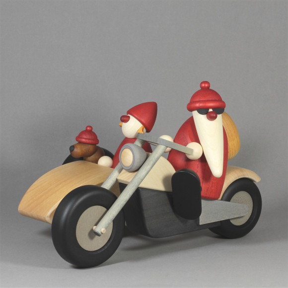 Weihnachtsmann Familienausflug auf Motorrad mit Beiwagen