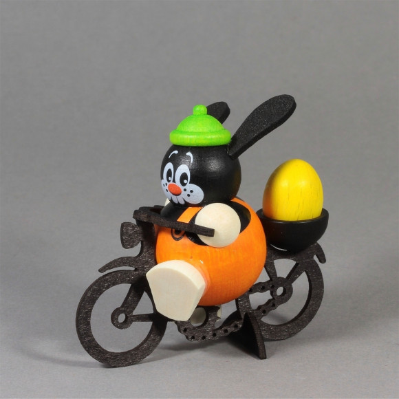 Kugelhase Osterhase auf Fahrrad