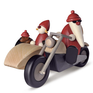 Weihnachtsmann Familienausflug auf Motorrad mit Beiwagen