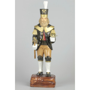Geschnitzter Bergmann mit Messing-Kerzenhalter farbig, Haar farbig, Hut schwarz 34 cm