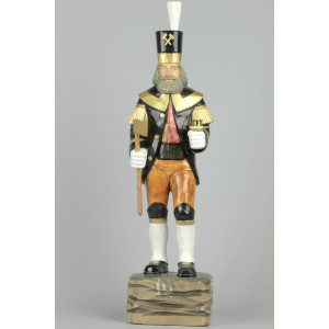 Geschnitzter Bergmann mit Messing-Kerzenhalter, farbig, Haar farbig, Hut schwarz, 47 cm