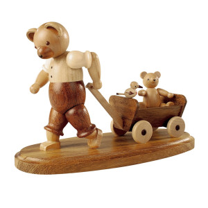 Bärenvater mit Kind auf Bollerwagen