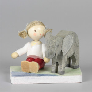 Mädchen mit Baby-Elefant