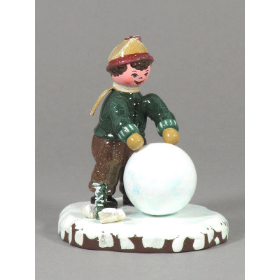 Winterkinder Junge mit Schneekugel
