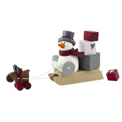 Schneemann Otto mit Geschenkeschlitten