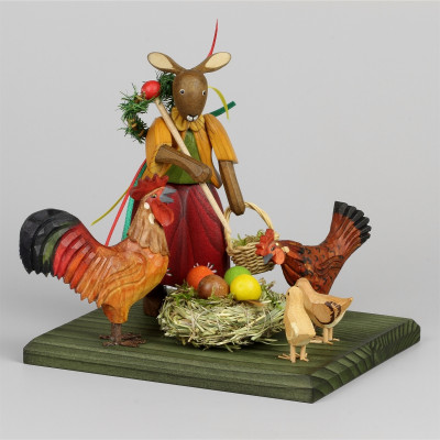 Osterhasenmädchen mit Hühnergruppe