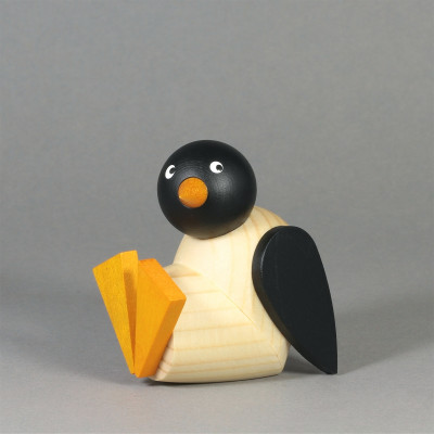 Pinguinkind sitzend