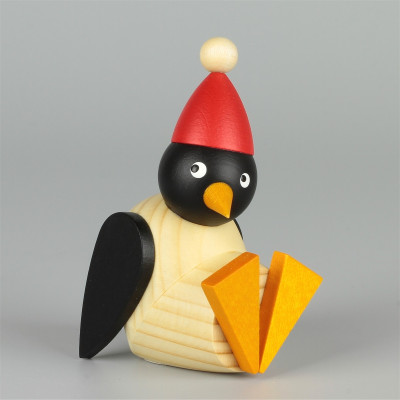 Pinguin sitzend mit Mütze klein