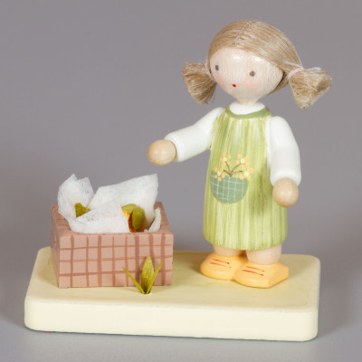 Flade Mädchen mit Maiskolben